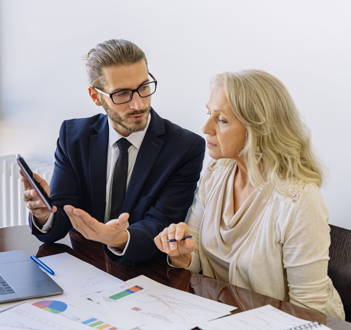 Advisor talking a client through their financial figures